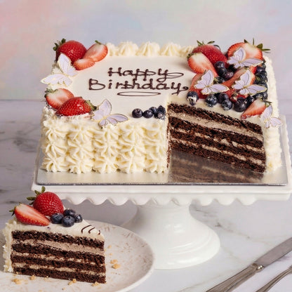 Decorated cake with Oreo filling from the Happy Family bakery