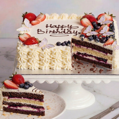 Decorated cake with raspberry cake base from the Happy Family bakery