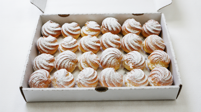 Profiteroles with cheese from the Happy Family Bakery